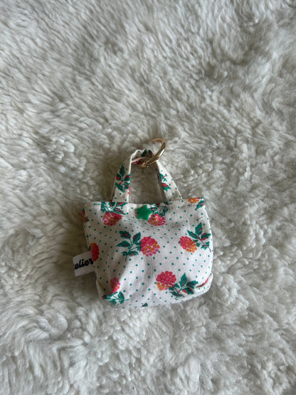 Poop bag blanc à pois fleuri