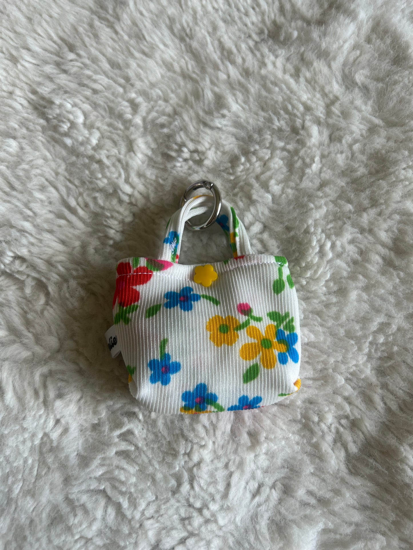 Poop bag blanc fleuri coloré