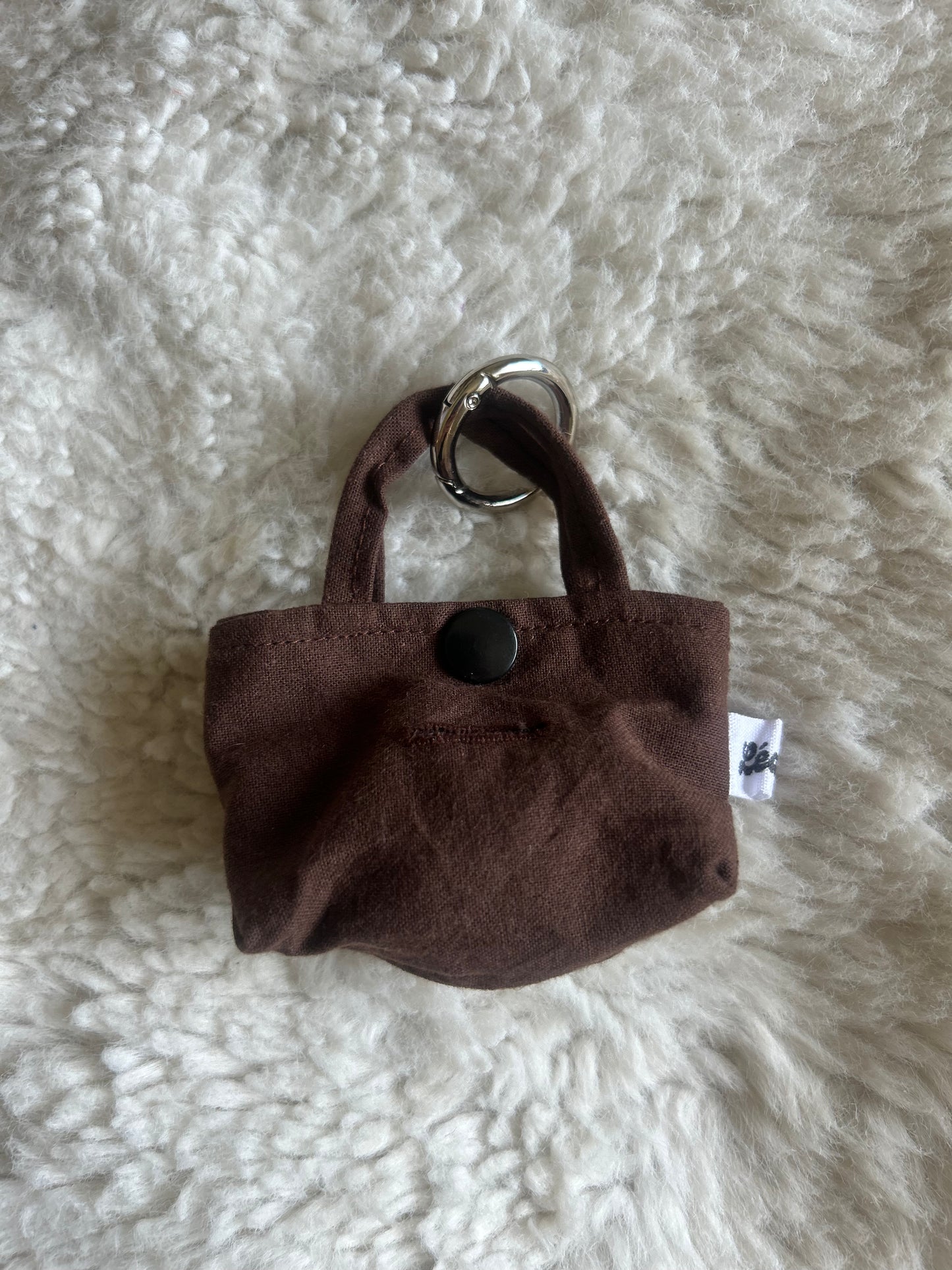 Poop bag marron