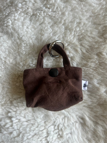 Poop bag marron