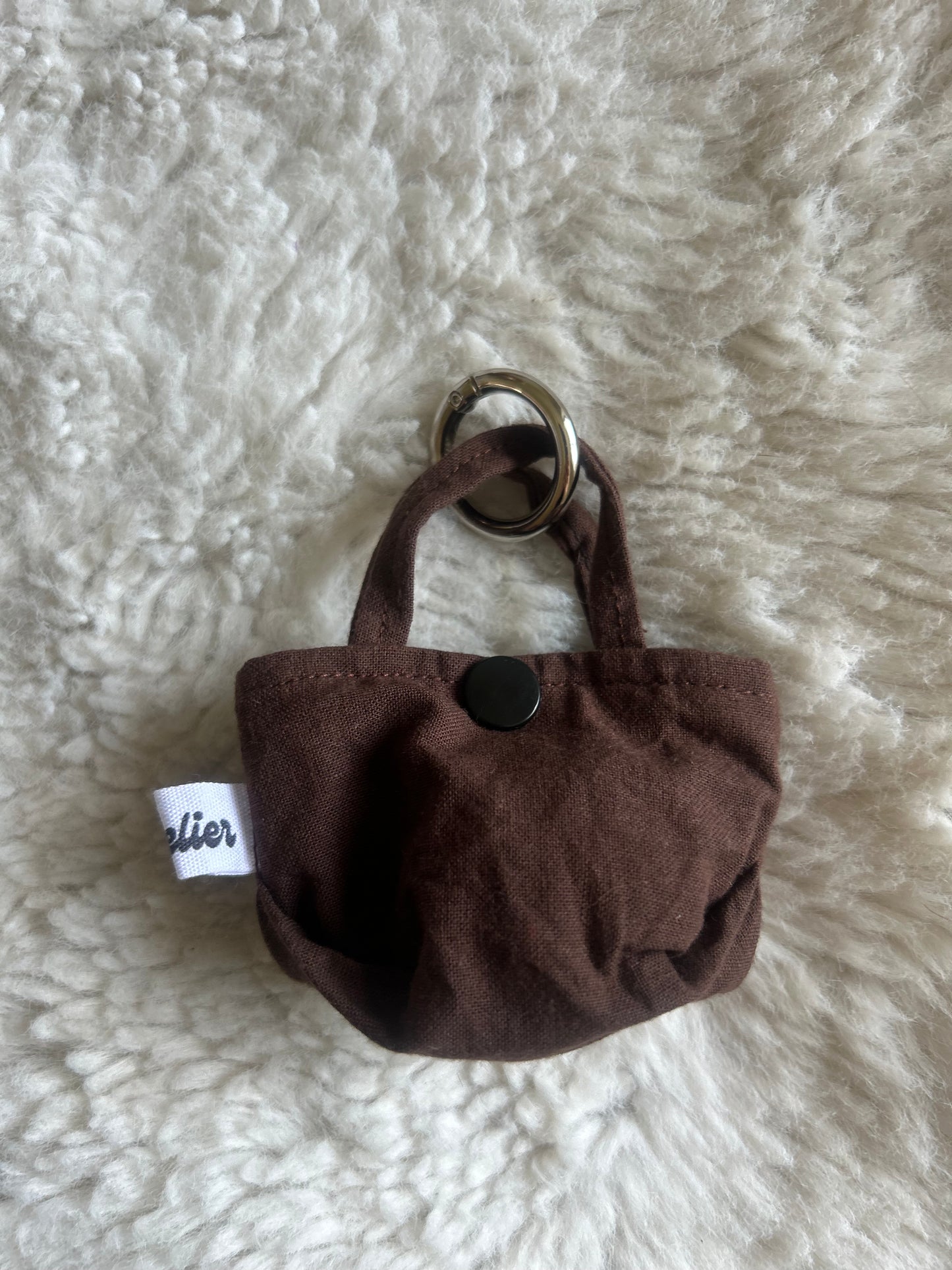 Poop bag marron